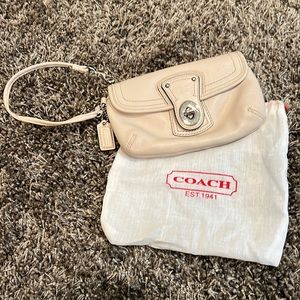 Coach wristlet, cream leather